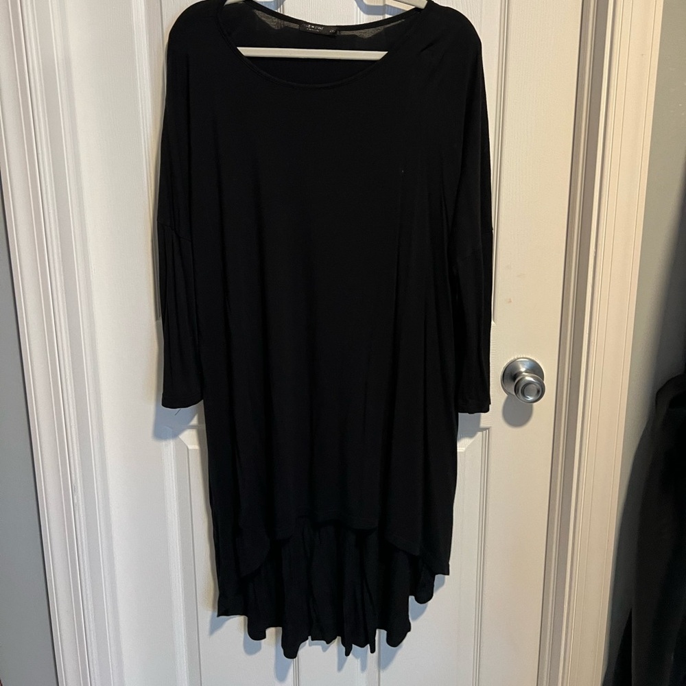 Oversized long sleeve shirt goes great with leggings could be worn as a dress